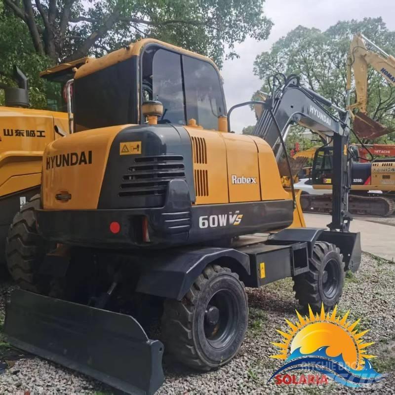 Hyundai r60wvs حفارات بعجل