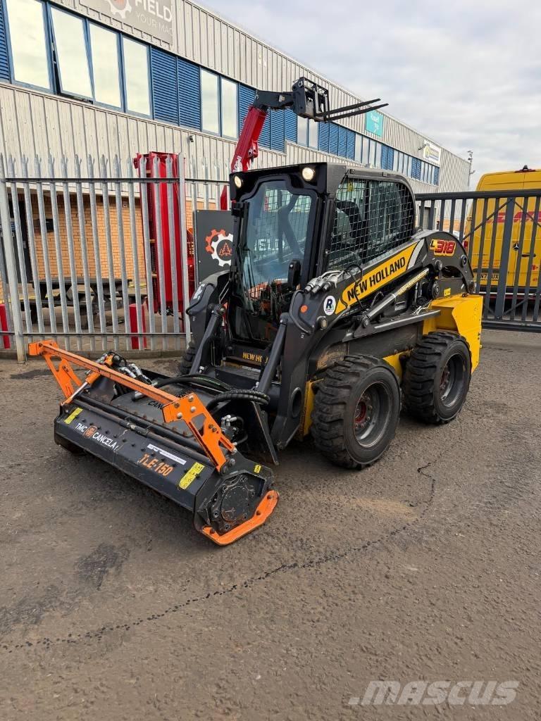 New Holland L 318 لوادر صغيرة