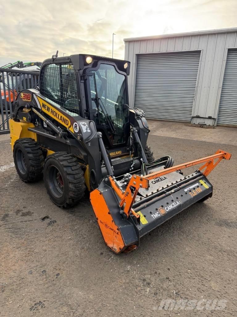 New Holland L 318 لوادر صغيرة