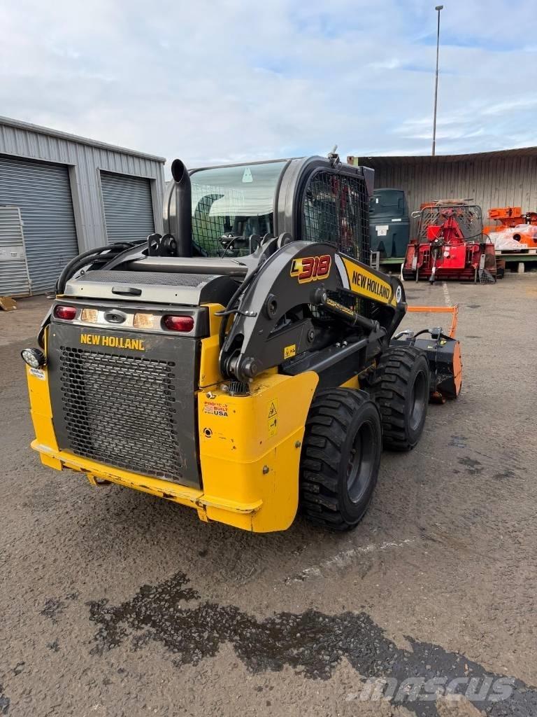 New Holland L 318 لوادر صغيرة