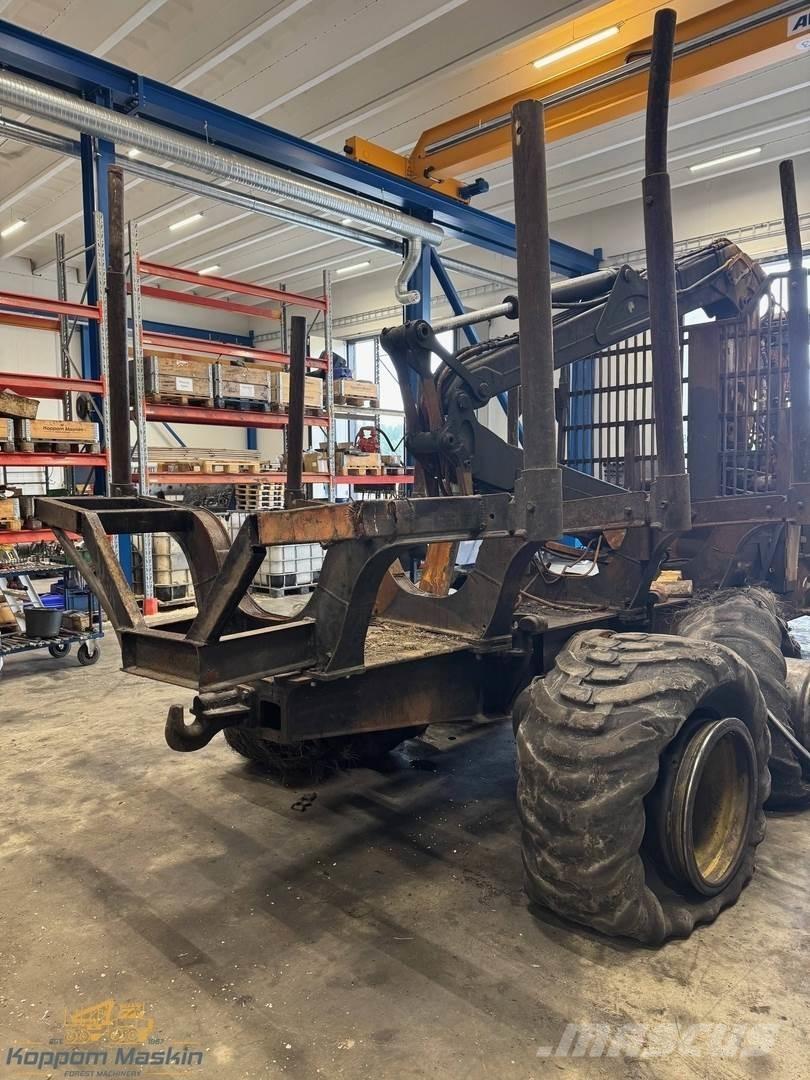 John Deere 1010E شاحنات