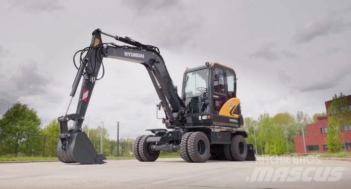 Hyundai HW 65 A حفارات بعجل
