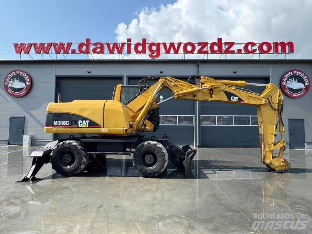 CAT M 316 C حفارات بعجل