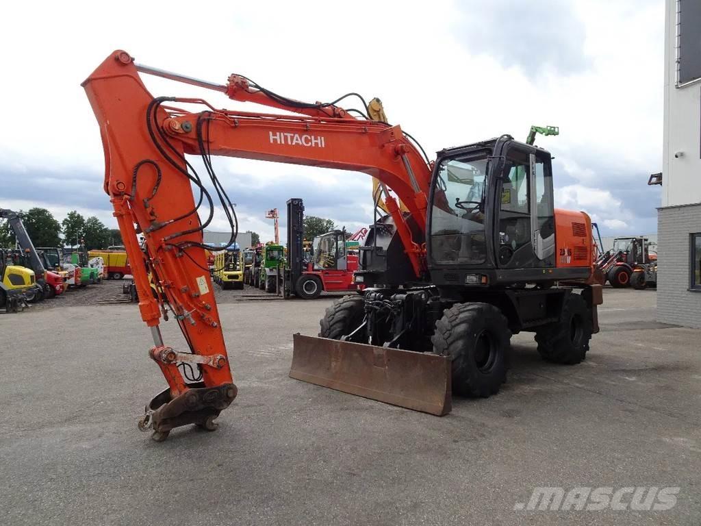 Hitachi ZX140W-3 حفارات بعجل