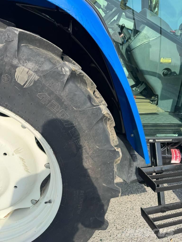 New Holland TL 90 A الجرارات