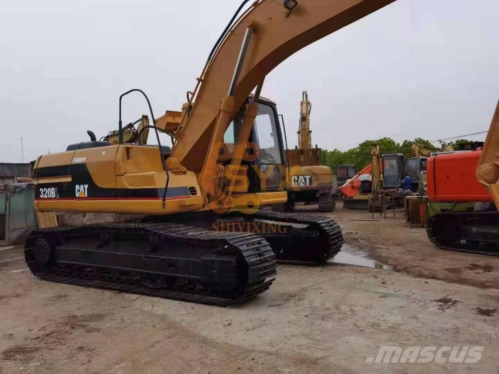 CAT 320 B L حفارات زحافة
