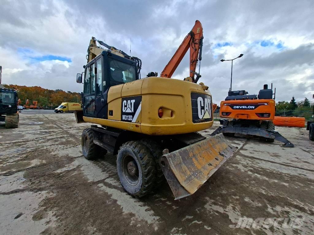 CAT M313D حفارات بعجل