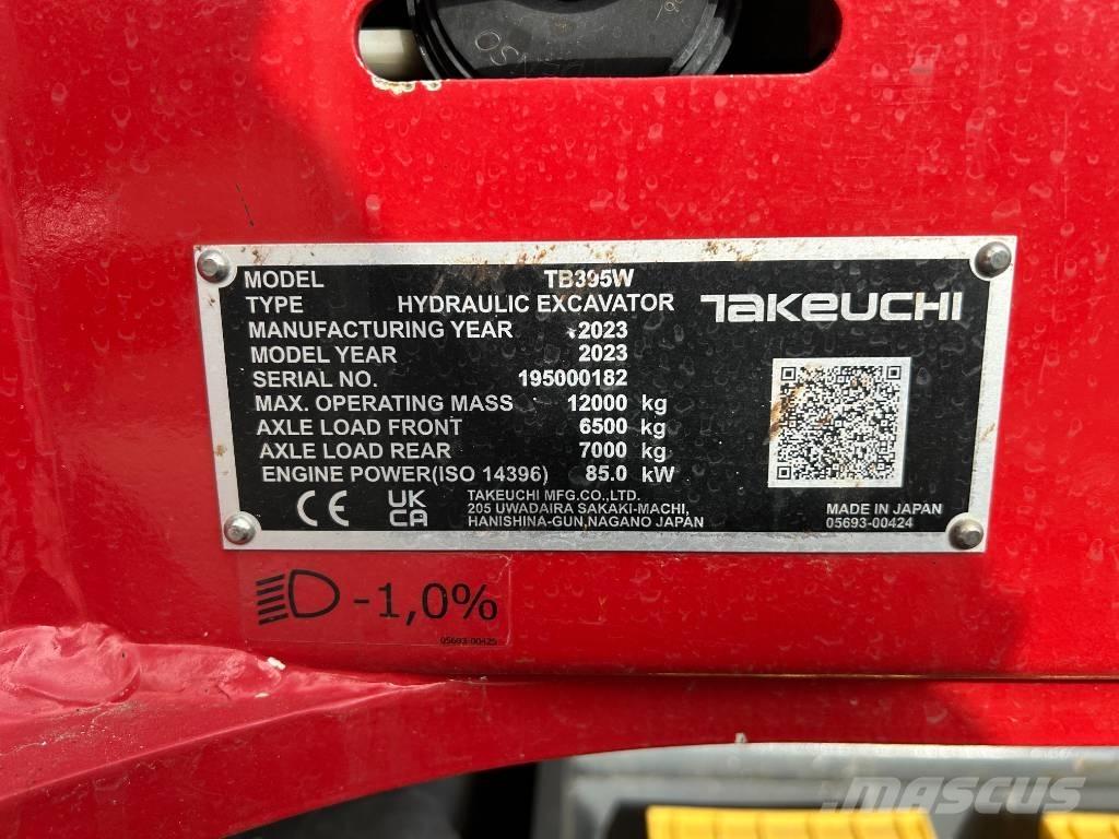 Takeuchi TB 395 W حفارات بعجل