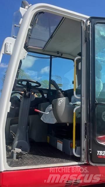 Takeuchi TB295W حفارات بعجل