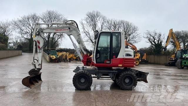 Takeuchi TB295W حفارات بعجل