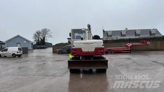 Takeuchi TB295W حفارات بعجل