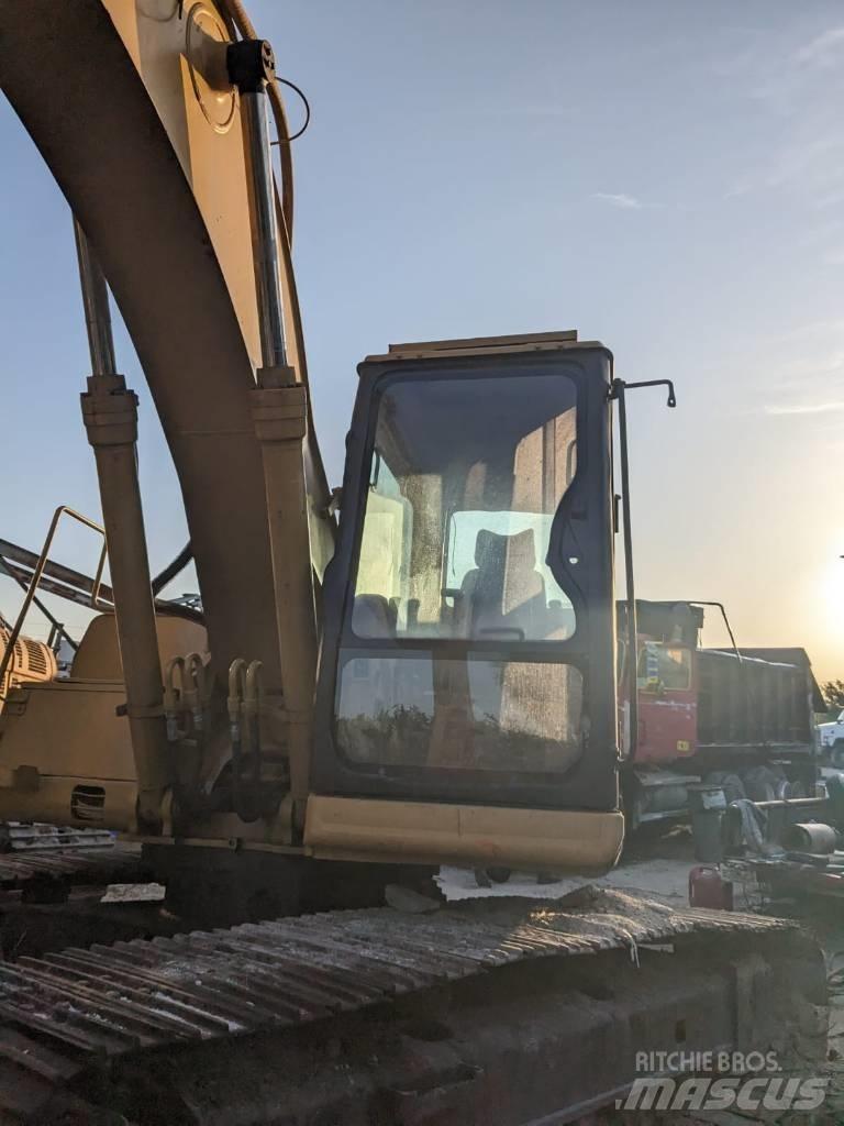 CAT 320 B L لوادر بعجل