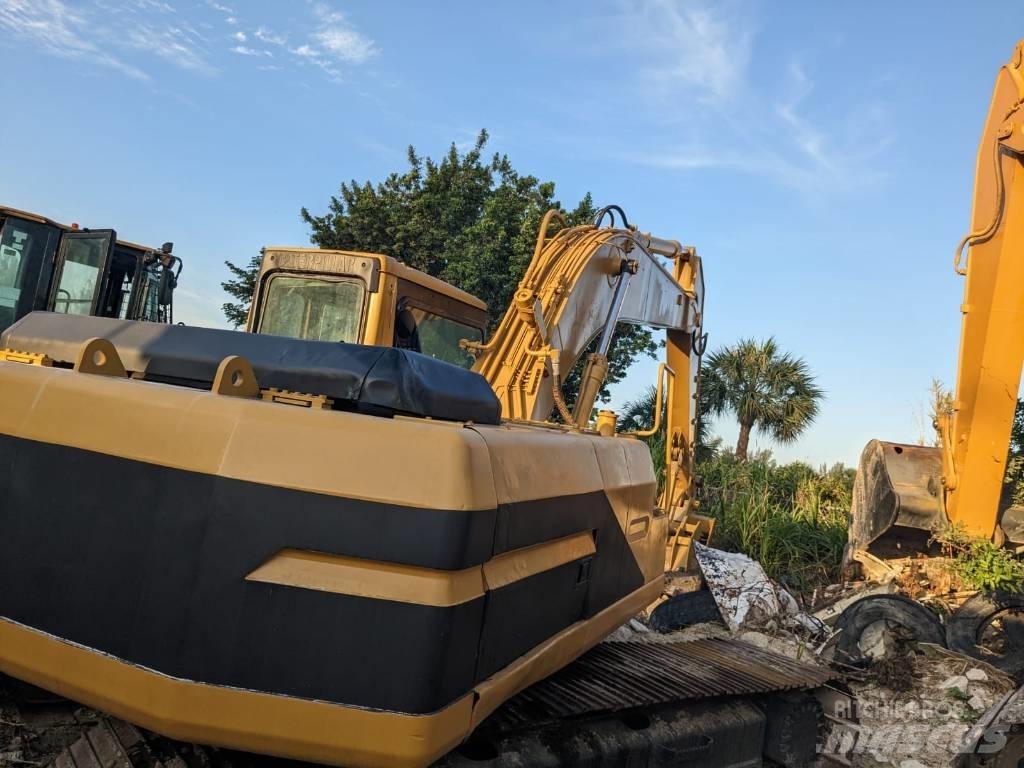 CAT 320 B L لوادر بعجل