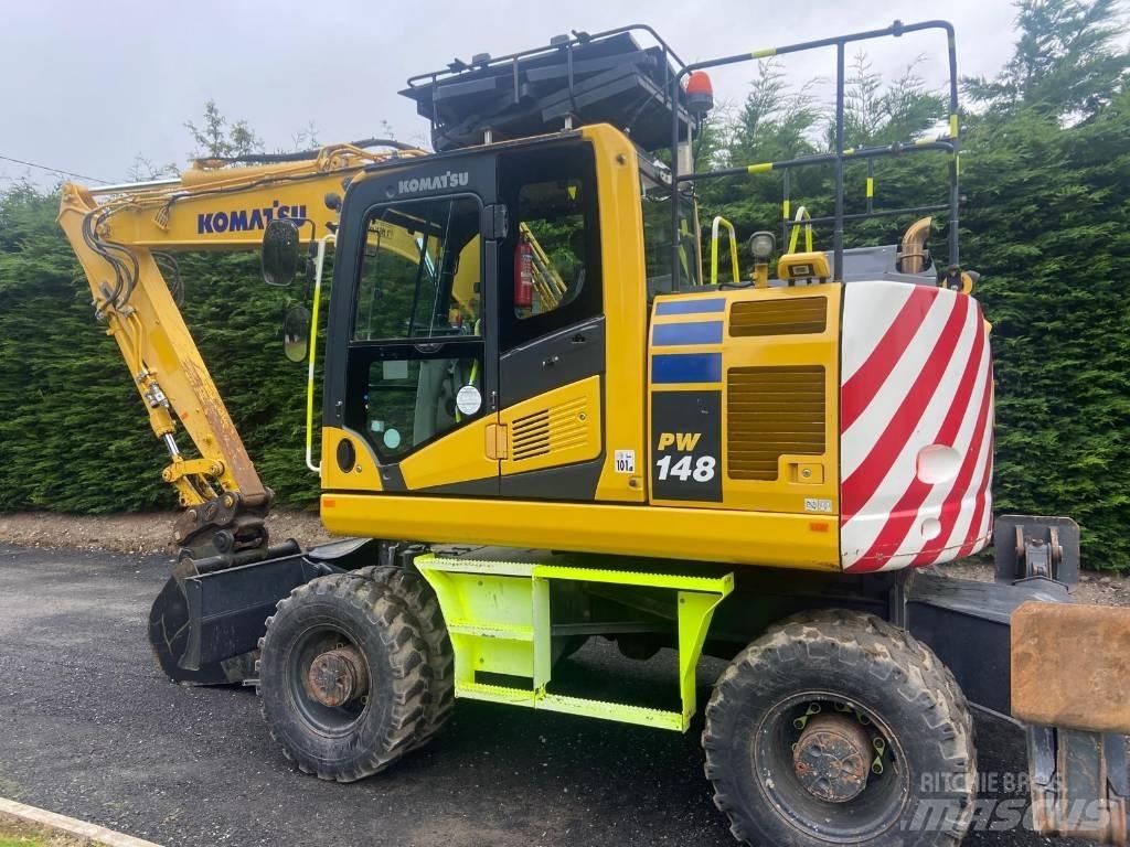 Komatsu PW 148 حفارات بعجل