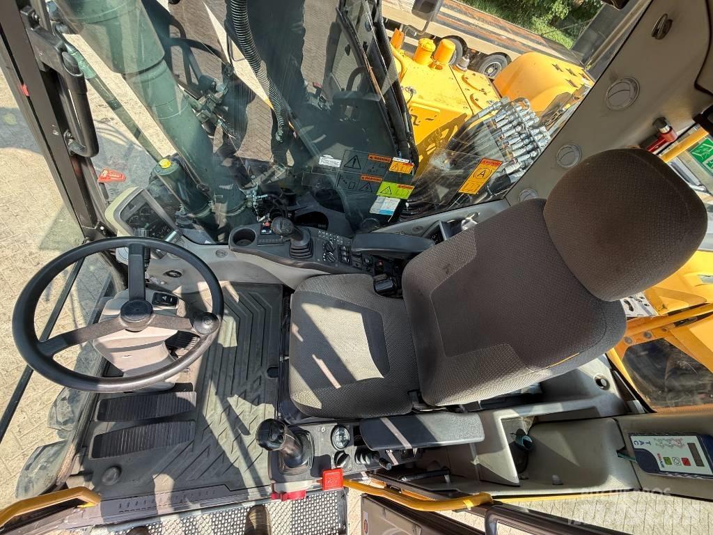 Volvo EW 140 D حفارات بعجل