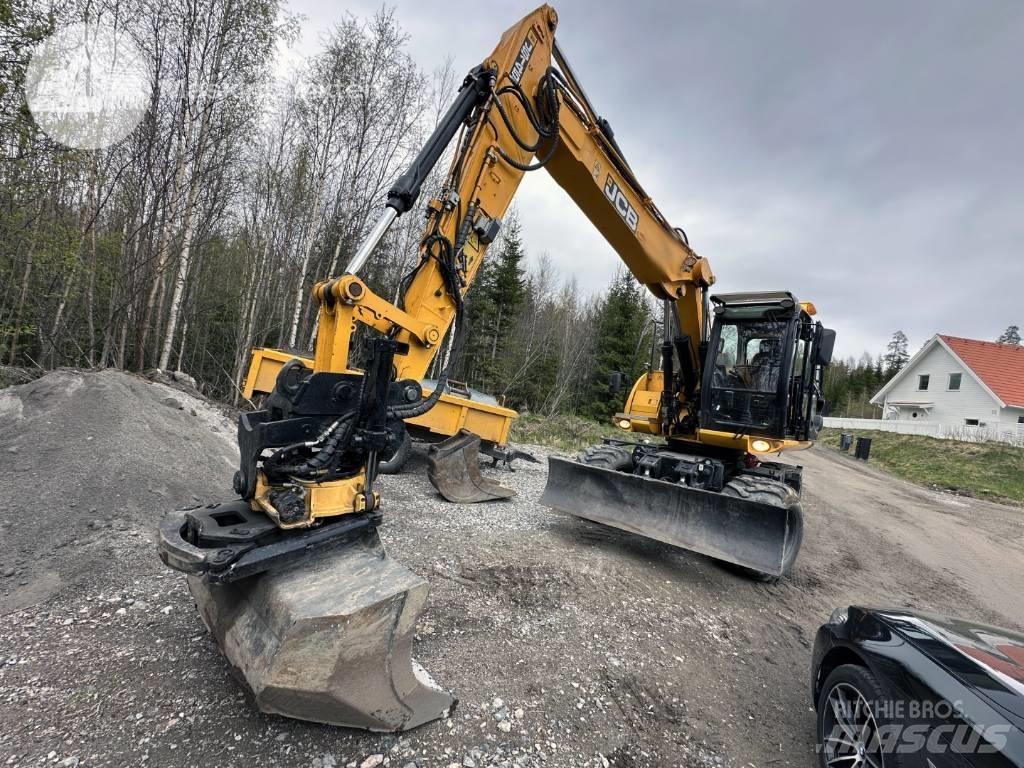 JCB JS 145 W حفارات بعجل