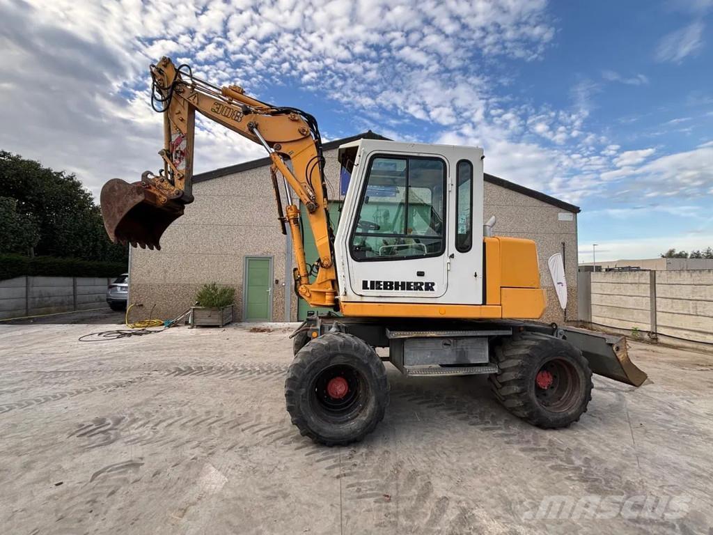 Liebherr A308 حفارات بعجل