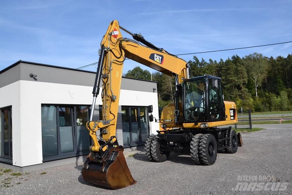 CAT M 315 D حفارات بعجل