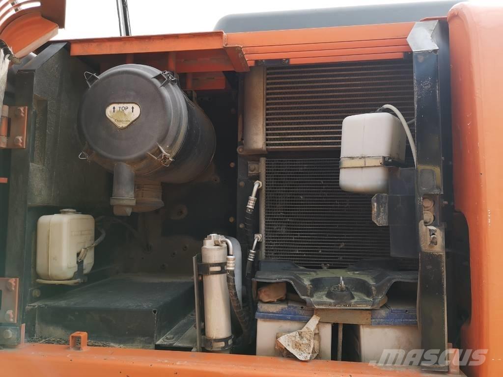 Hitachi ZX 130 W حفارات بعجل