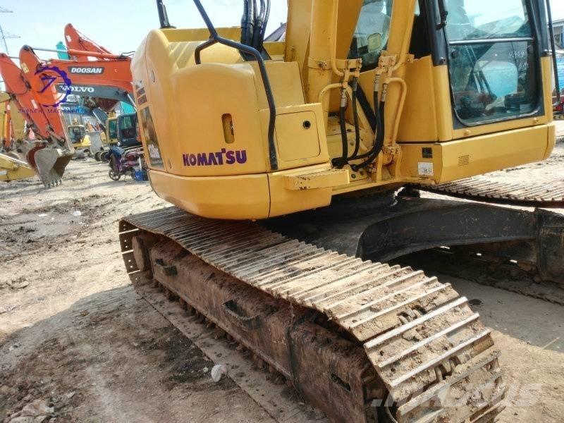 Komatsu PC 128 US حفارات وسط 7 طن - 12 طن