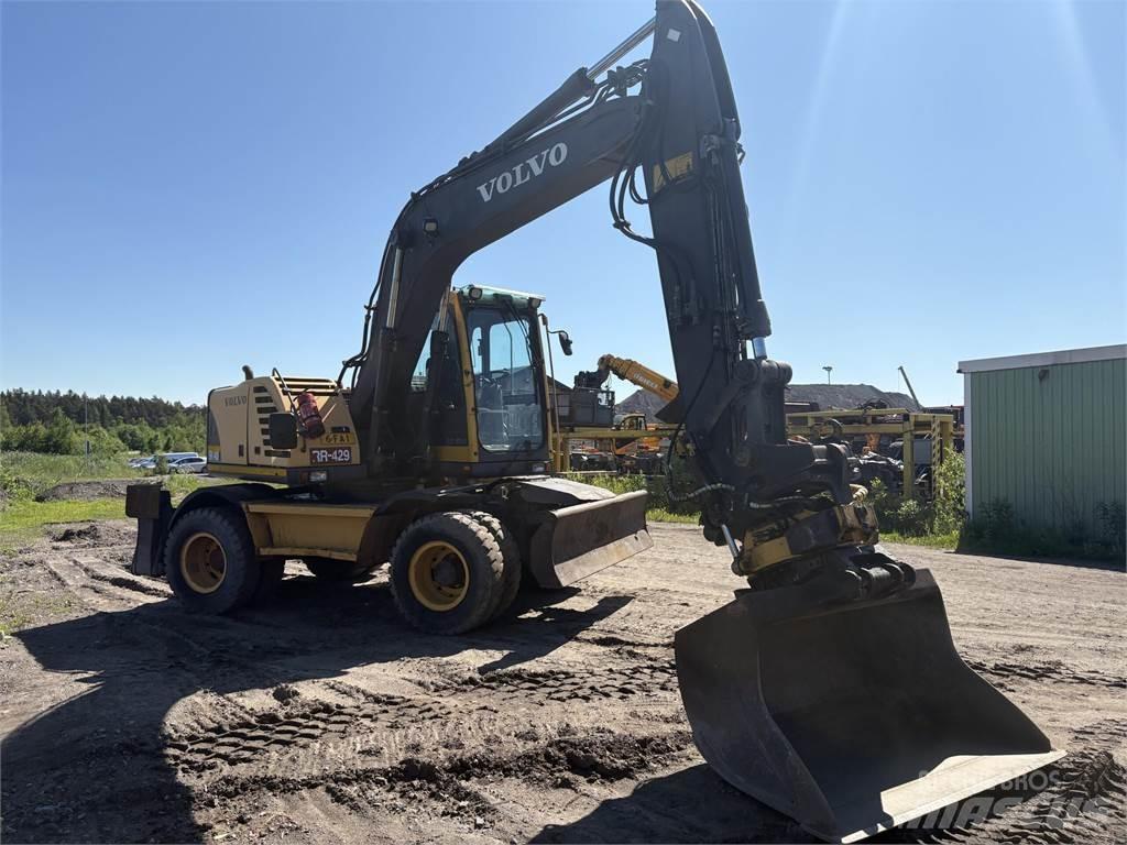 Volvo EW140 B حفارات بعجل