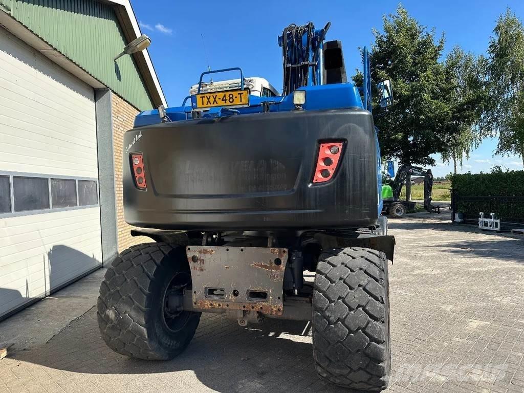 Volvo EW140D حفارات بعجل