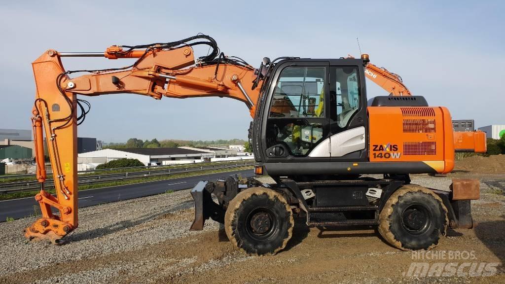 Hitachi ZX140W-5B حفارات بعجل