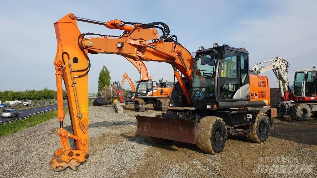 Hitachi ZX140W-5B حفارات بعجل