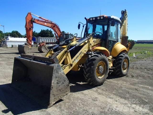 New Holland B 115 B لوادر ذات جرافات عكسية