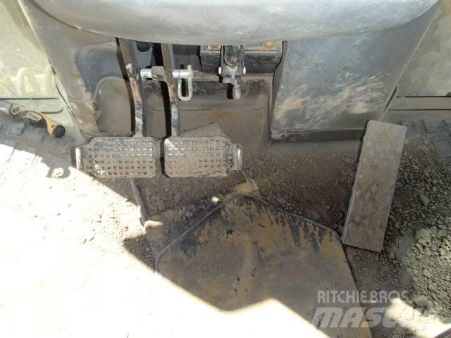 New Holland B 115 B لوادر ذات جرافات عكسية