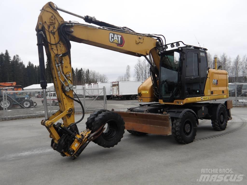 CAT M 318 حفارات بعجل