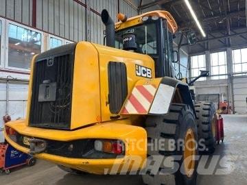 JCB 427 ZX T4 لوادر ذات جرافات عكسية