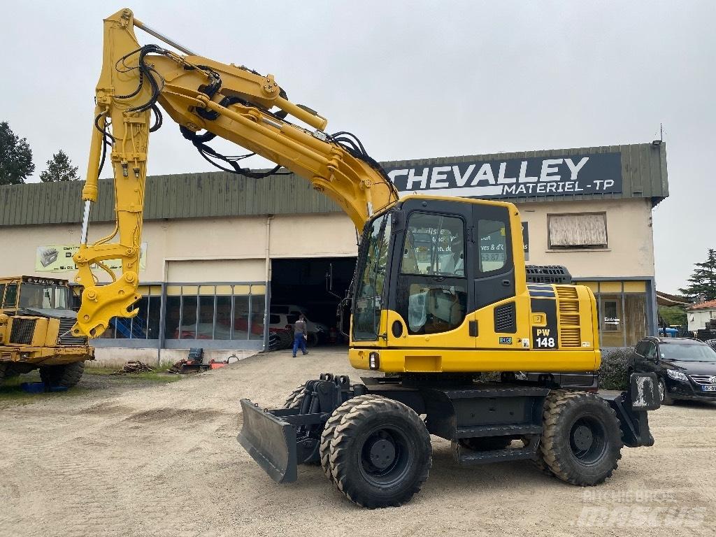 Komatsu PW 148-8 حفارات بعجل