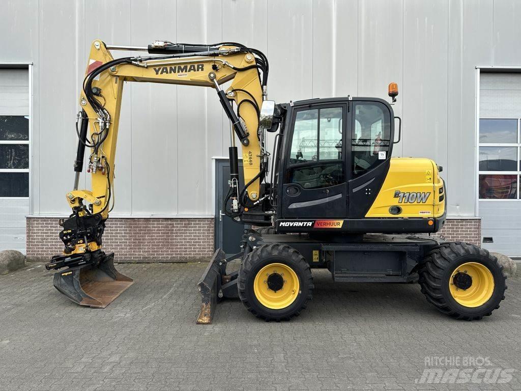 Yanmar B110W حفارات بعجل