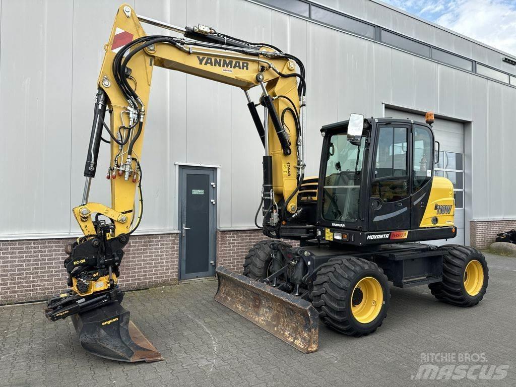 Yanmar B110W حفارات بعجل