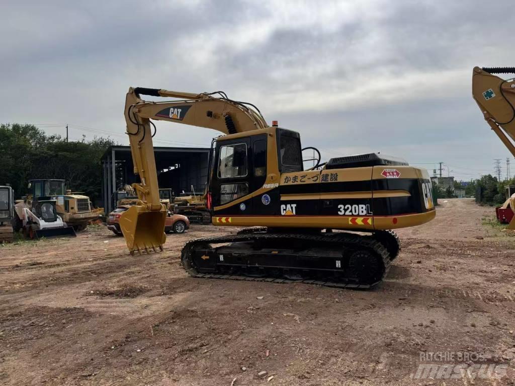 CAT 320 B L حفارات زحافة