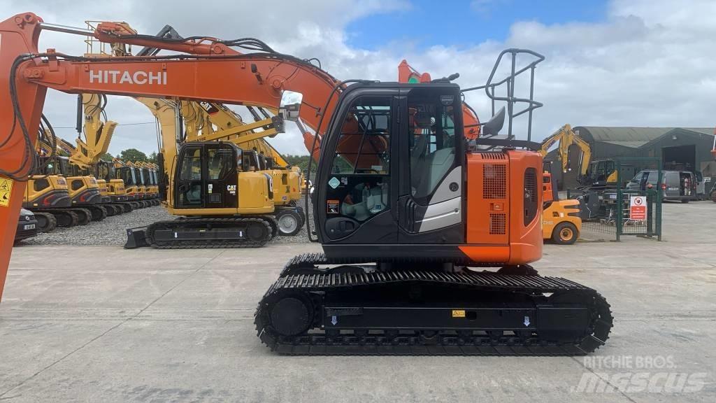 Hitachi ZX 135 US-6 حفارات زحافة