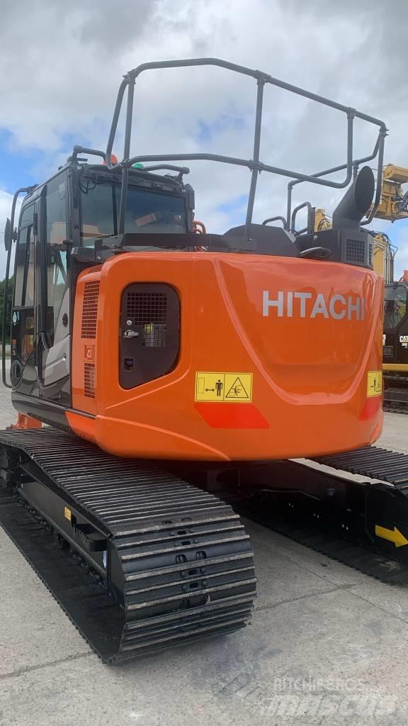 Hitachi ZX 135 US-6 حفارات زحافة