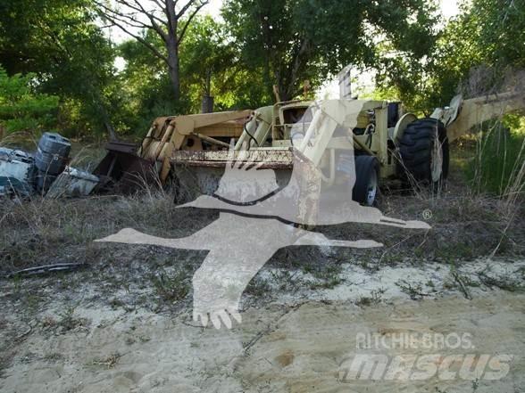 Ford 555 لوادر ذات جرافات عكسية