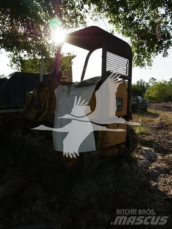 John Deere 450 لوادر زحافة