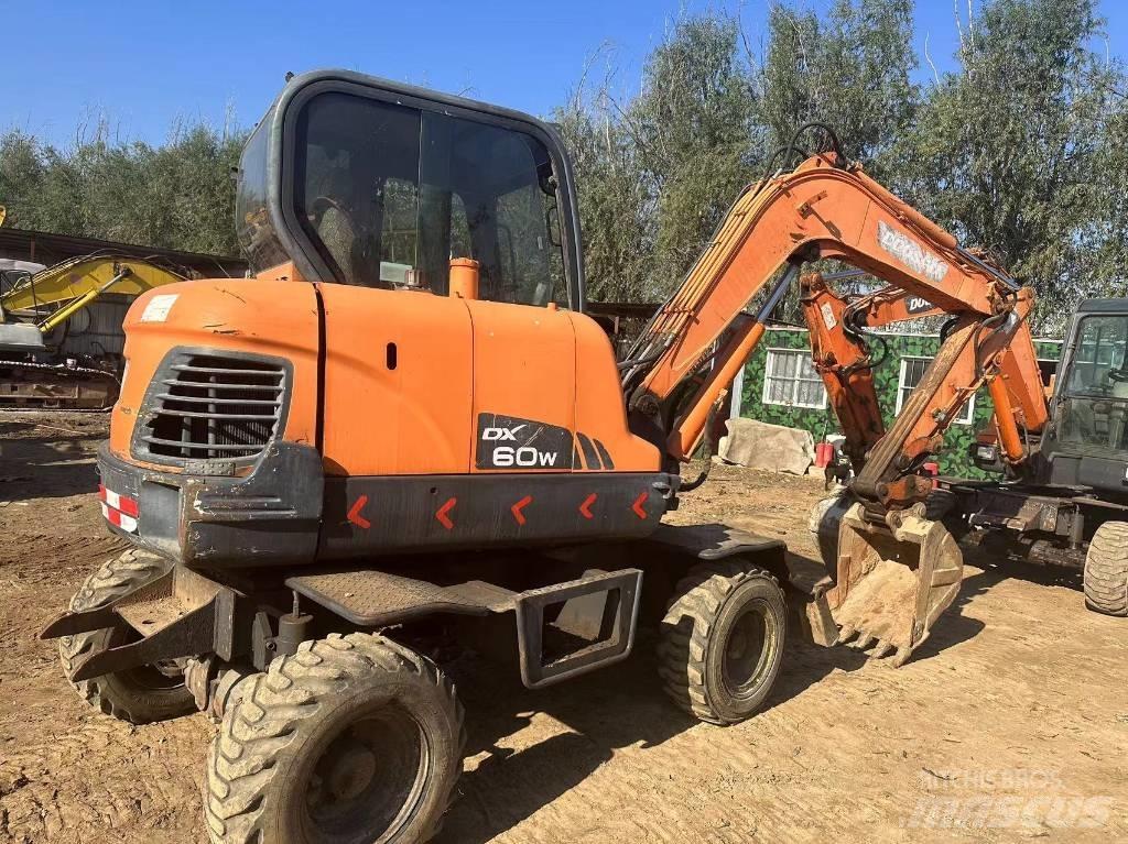 Doosan DX60W حفارات صغيرة أقل من 7 طن (حفارات صغيرة)