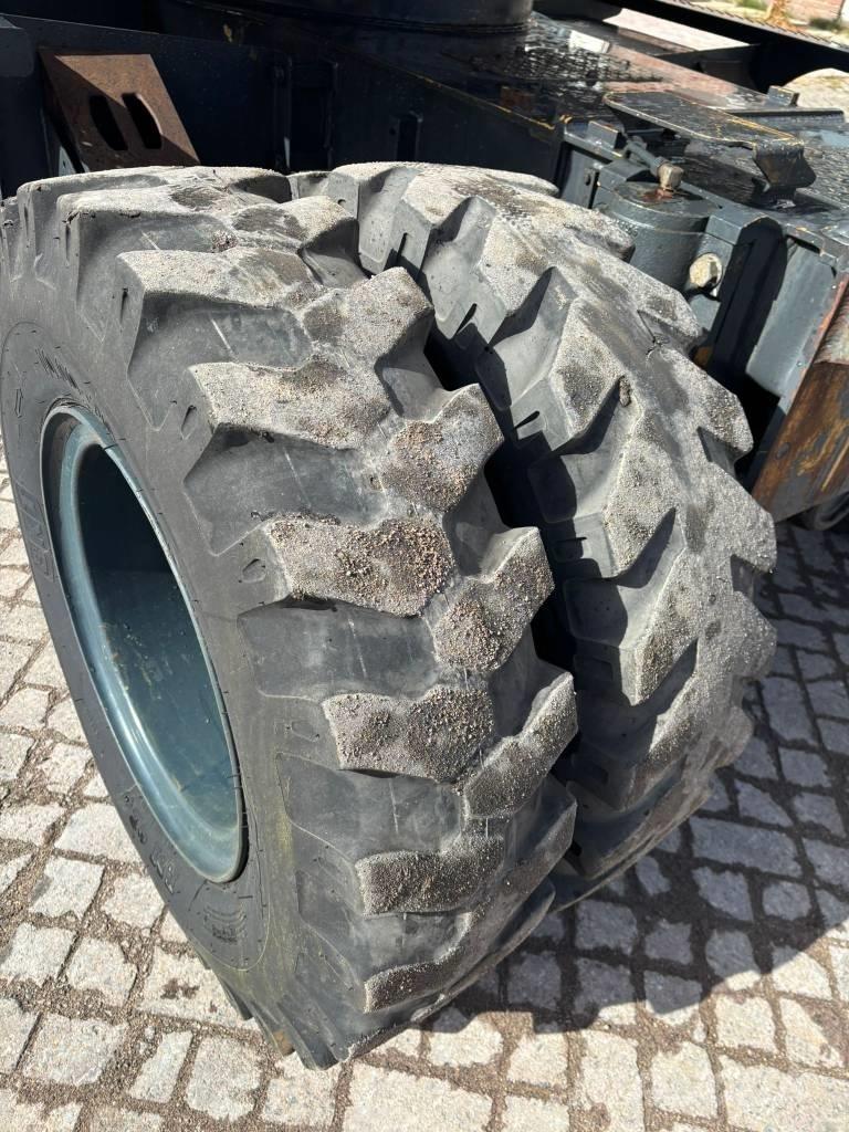 Hyundai 140W-7A حفارات بعجل