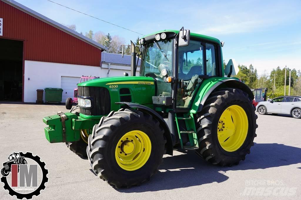 John Deere 6330 الجرارات