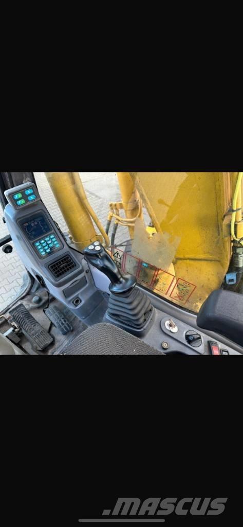 Komatsu PW 130-7K حفارات بعجل