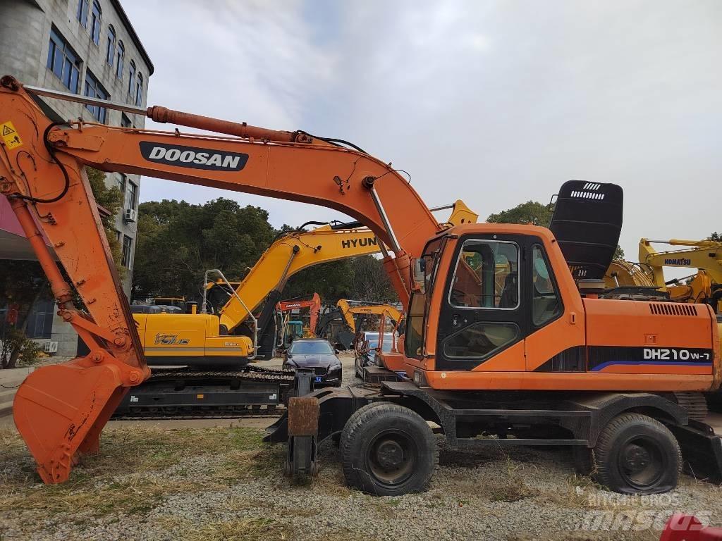 Doosan DH 210 W-7 حفارات بعجل
