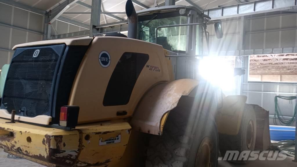 New Holland W 270 B لوادر بعجل