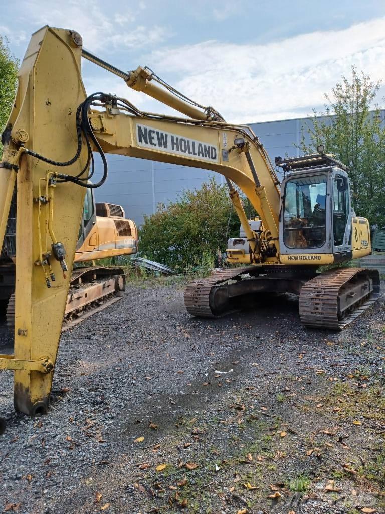 New Holland E 215 B حفارات زحافة