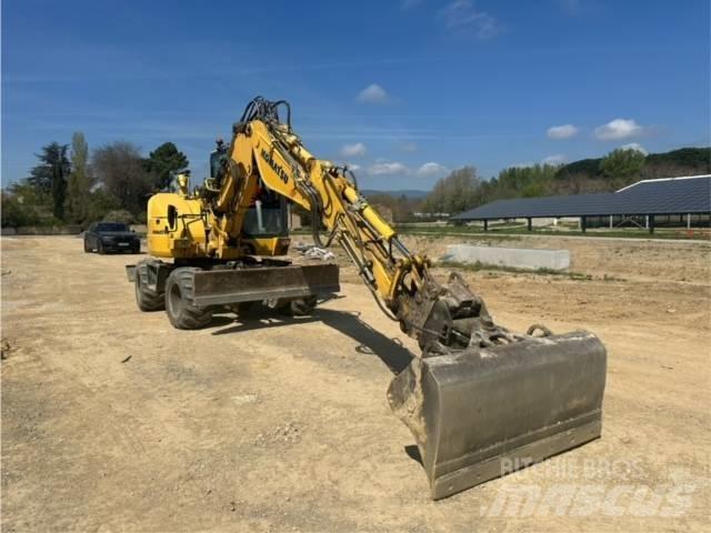 Komatsu PW98 MR-10 حفارات بعجل