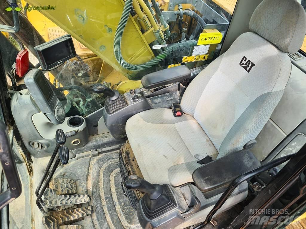 CAT 319 D L حفارات زحافة