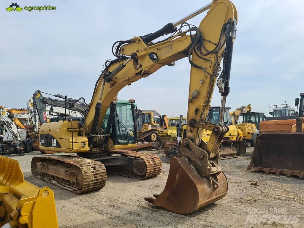 CAT 319 D L حفارات زحافة